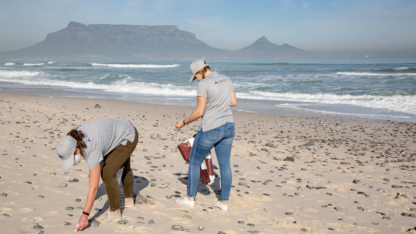 ASI team members clean up beach in Cape Town